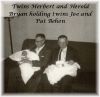 Herbert and Herold Bryan holding Behen twins